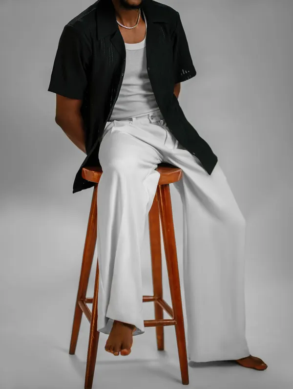 Open-collar shirt with white wide-leg trousers on Instagram