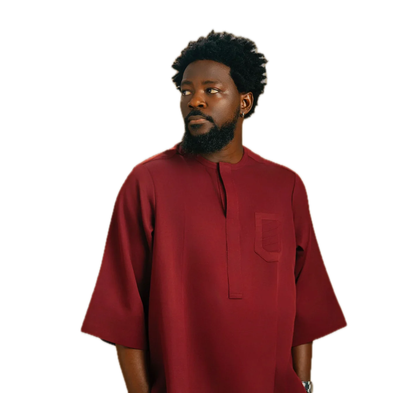 Burgundy kaftan, shown on the label’s gold panel